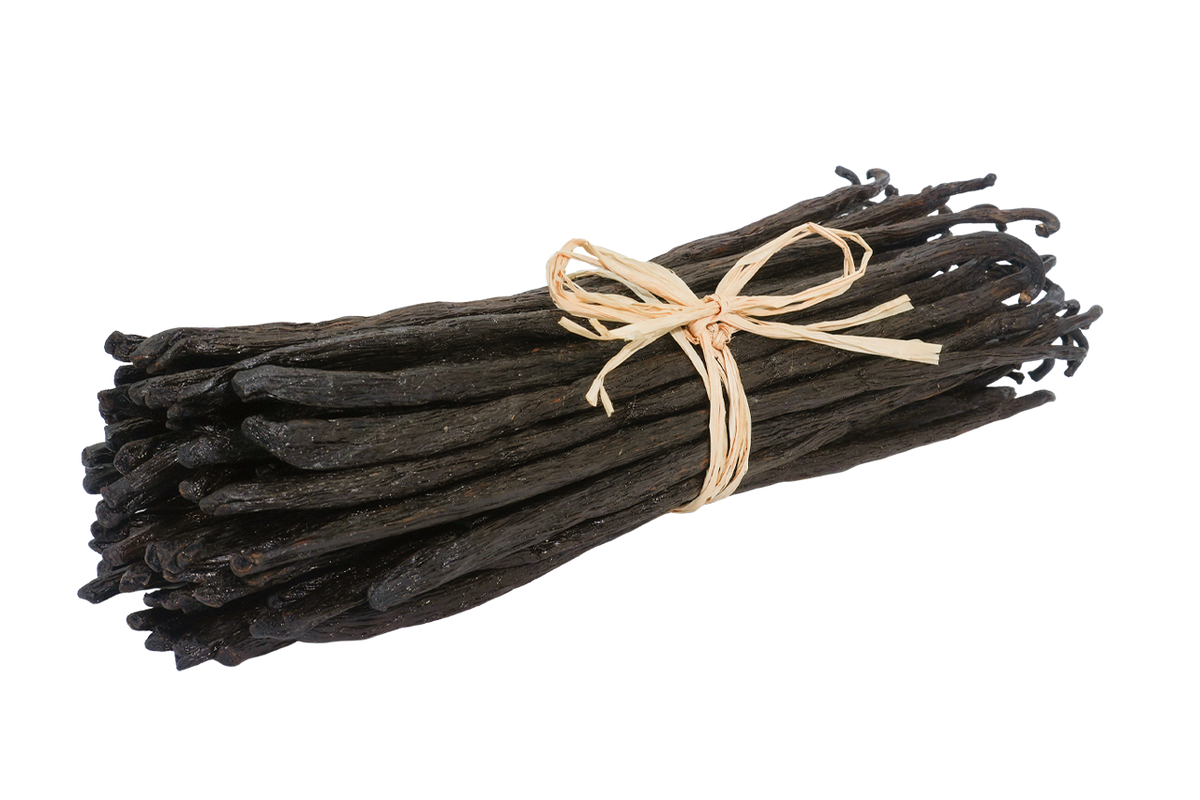 Madagascar Bourbon TK vanilla beans bundled with natural raffia, showing their long, dark brown pods and slightly wrinkled texture.
