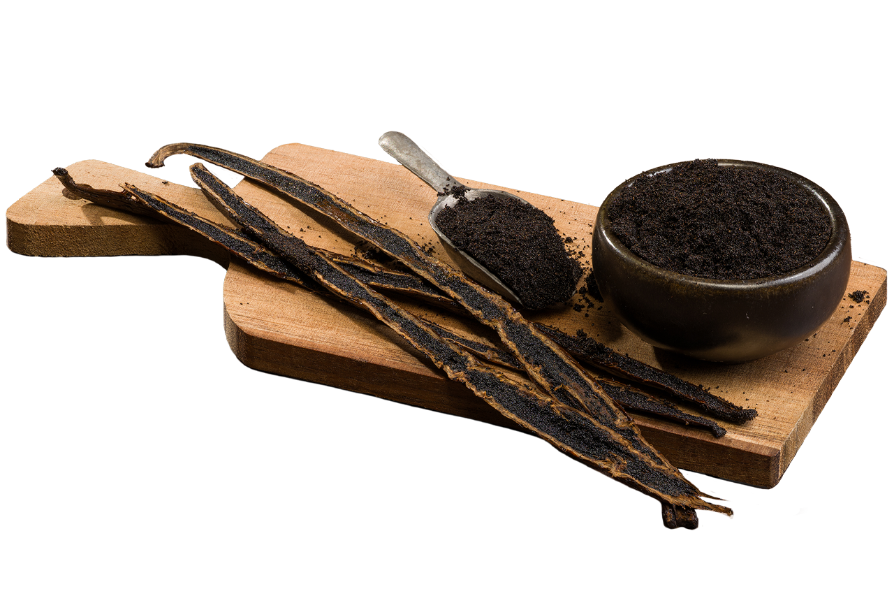 
                        Madagascar Bourbon vanilla caviar in a bowl and spoon, surrounded by split vanilla beans on a wooden board.
                      